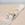 CINTURON FLORES PLUMAS BLANCO - Imagen 1