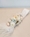 CINTURON FLORES PLUMAS BLANCO - Imagen 1