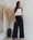 PANTALÓN ANCHO NEGRO - Imagen 1
